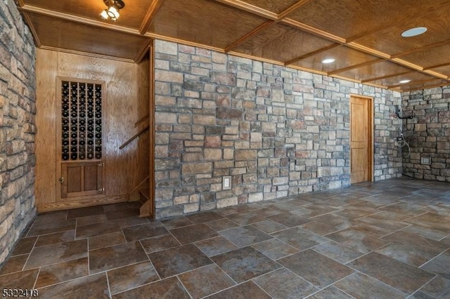 wine area with wooden ceiling and coffered ceiling