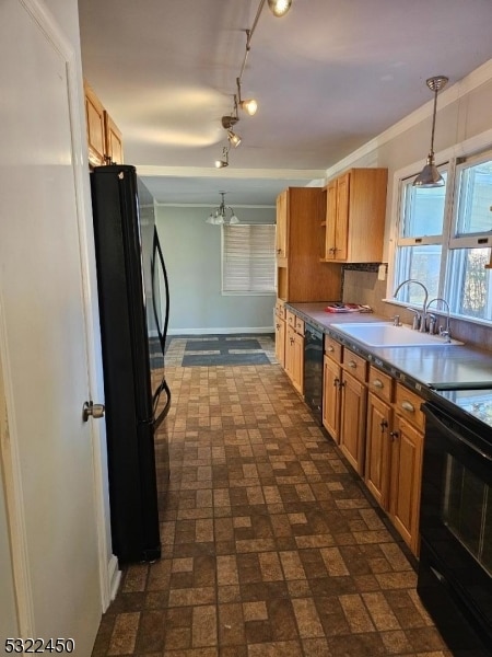 kitchen with an inviting chandelier, ornamental molding, black appliances, sink, and decorative light fixtures