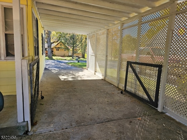 view of patio / terrace featuring a carport