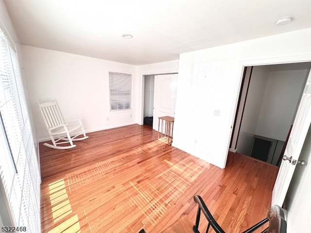 unfurnished room featuring hardwood / wood-style floors