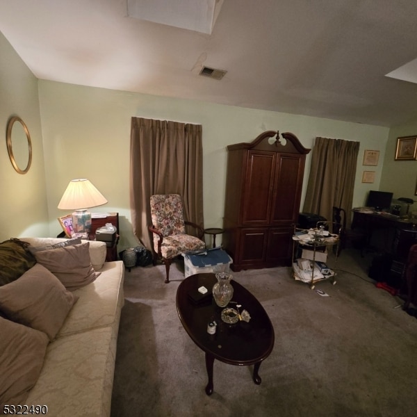 living room featuring carpet floors