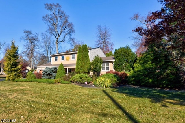 view of front of home with a front yard