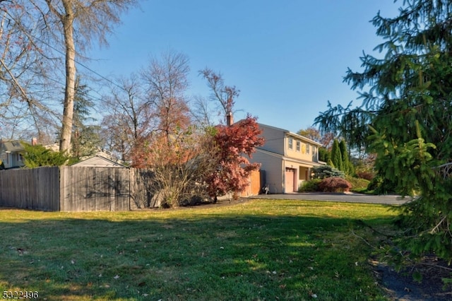 view of yard featuring a garage