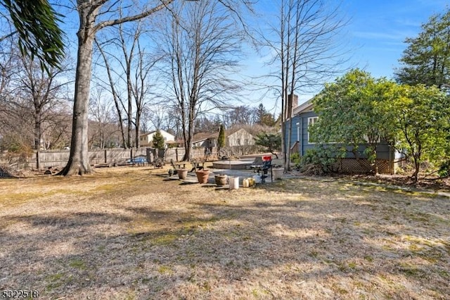 view of yard with fence