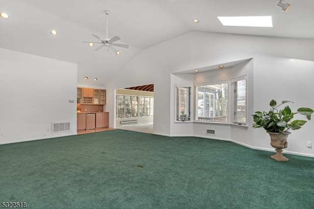 unfurnished living room featuring carpet floors, visible vents, and a healthy amount of sunlight