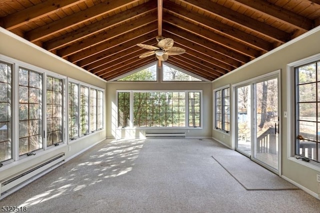 unfurnished sunroom featuring a baseboard heating unit, a wealth of natural light, and lofted ceiling with beams