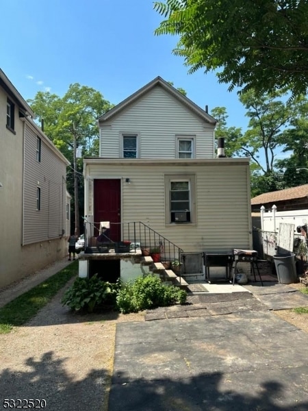 back of property with a patio area