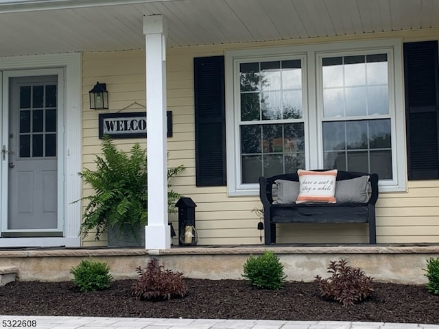 entrance to property with a porch