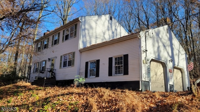 view of home's exterior featuring a garage