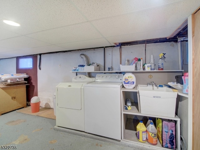 laundry area with sink and washer and dryer