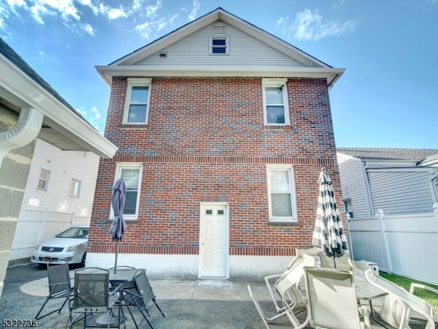 rear view of property with a patio area