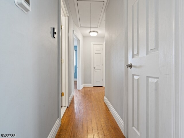 corridor featuring light wood-type flooring