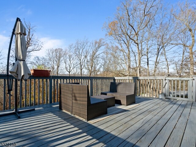 wooden deck with outdoor lounge area