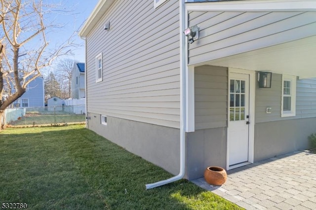 view of property exterior featuring a yard