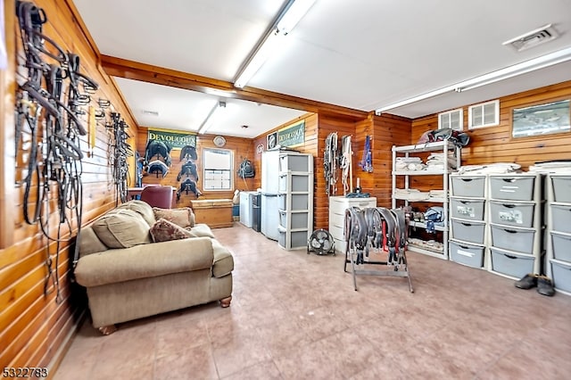 living room featuring wooden walls