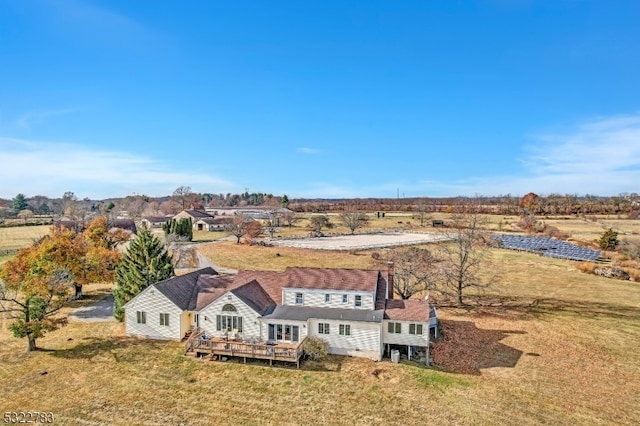 birds eye view of property featuring a rural view