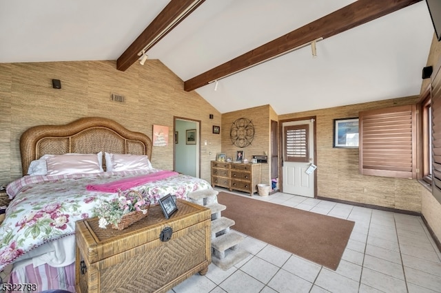 bedroom with high vaulted ceiling, beamed ceiling, and light tile patterned floors