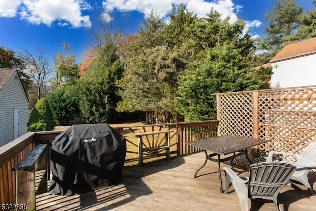 deck featuring grilling area