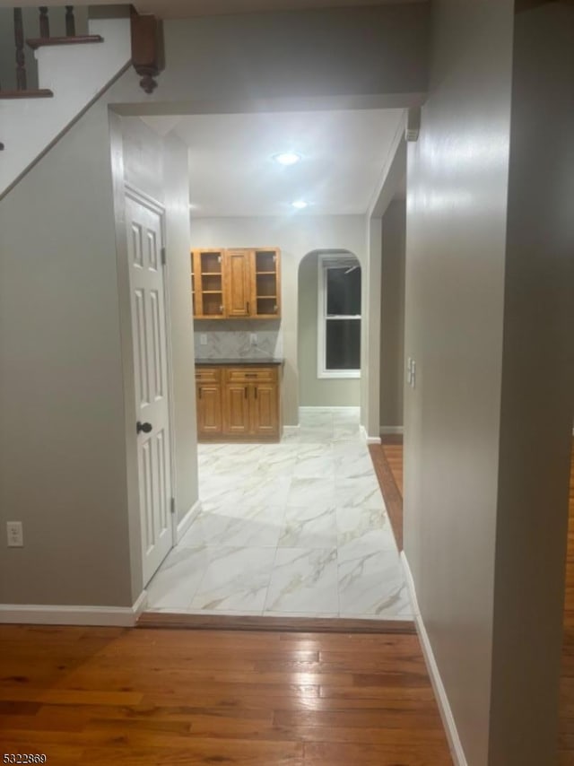 corridor featuring light hardwood / wood-style floors