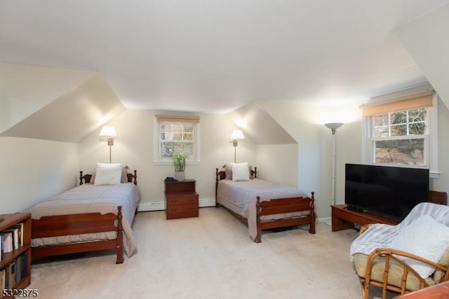 bedroom with lofted ceiling, baseboard heating, and light colored carpet