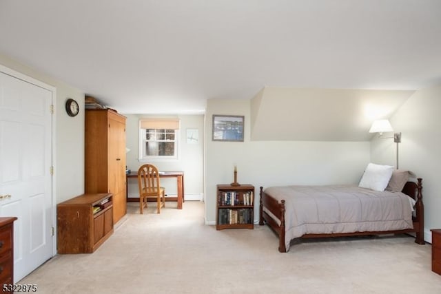 bedroom with light colored carpet