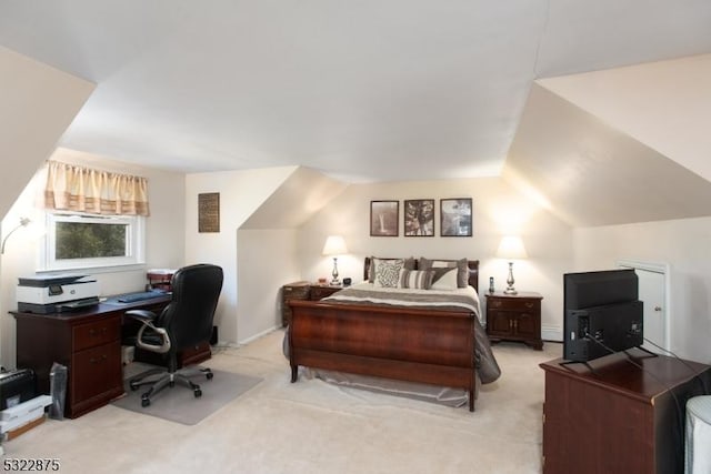 bedroom with light carpet and vaulted ceiling