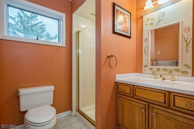 bathroom with a shower with shower door, vanity, and toilet