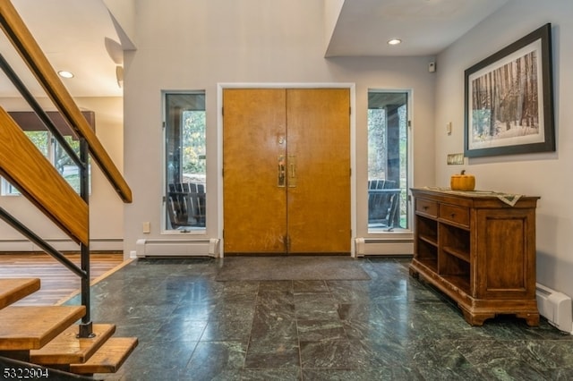 entrance foyer with a baseboard radiator