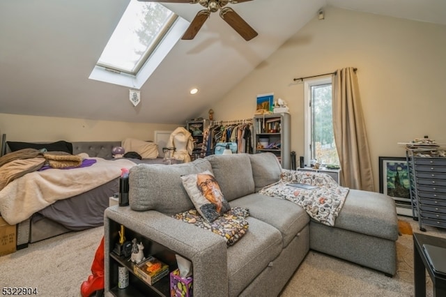 bedroom featuring lofted ceiling, ceiling fan, and light carpet