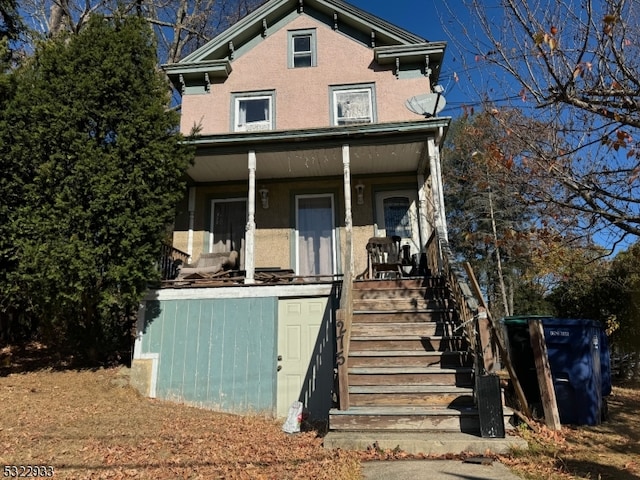 view of front of home featuring covered porch