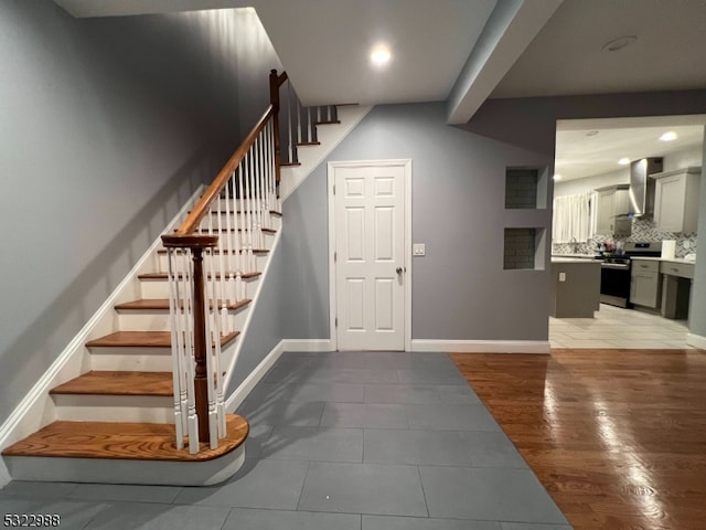 entrance foyer with hardwood / wood-style flooring