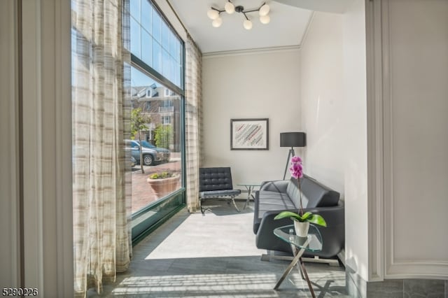 sitting room with ornamental molding