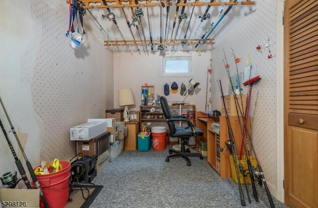 office area with wallpapered walls and carpet floors