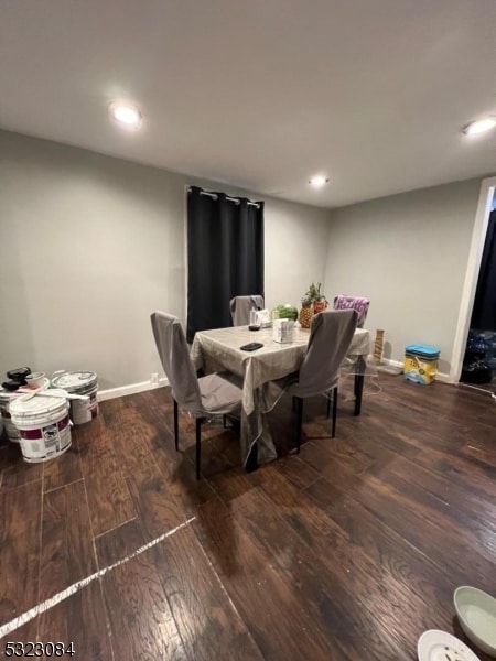 dining room featuring dark wood-type flooring