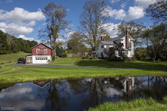 view of yard with a water view