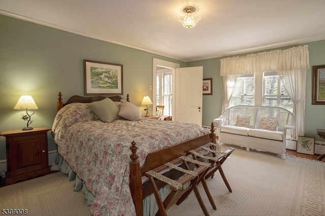 bedroom with crown molding