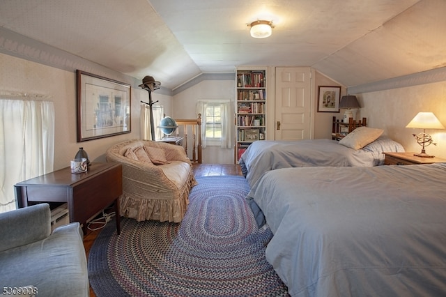 bedroom featuring vaulted ceiling