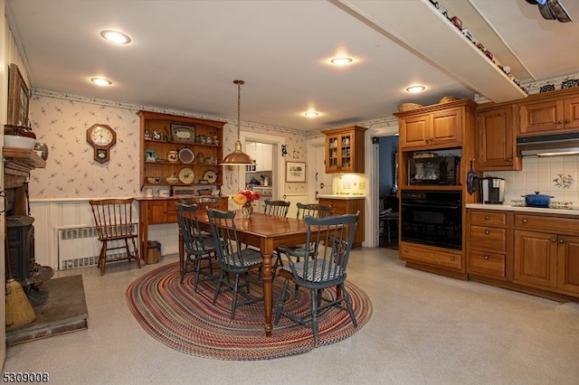 dining room with radiator