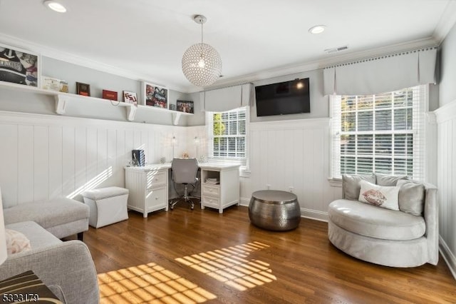 living area featuring visible vents, a wainscoted wall, ornamental molding, dark wood-type flooring, and recessed lighting