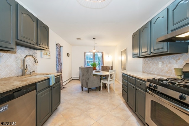 kitchen with decorative backsplash, decorative light fixtures, light stone counters, and stainless steel appliances