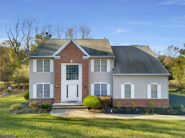 view of front of home featuring a front lawn