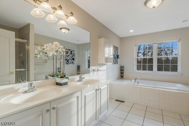 full bathroom featuring tile patterned floors, toilet, vanity, and plus walk in shower