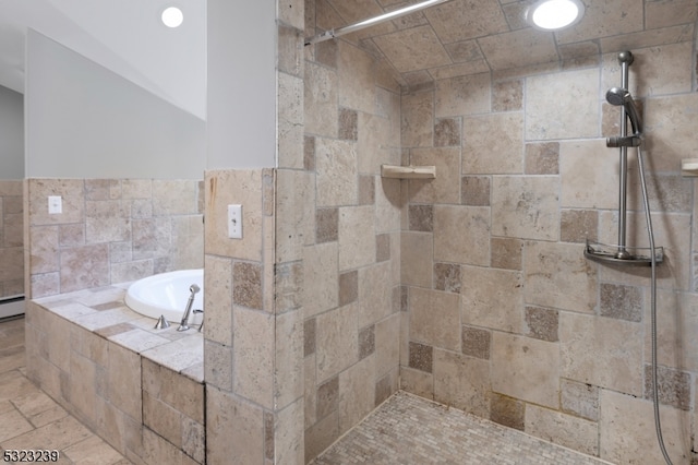 bathroom featuring tile walls, shower with separate bathtub, and a baseboard heating unit