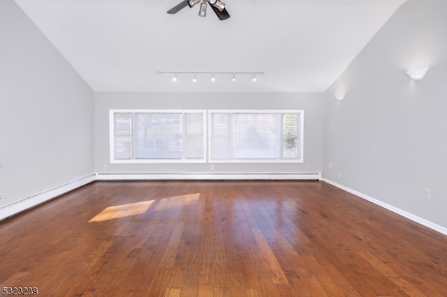 unfurnished room with dark hardwood / wood-style flooring, ceiling fan, and vaulted ceiling