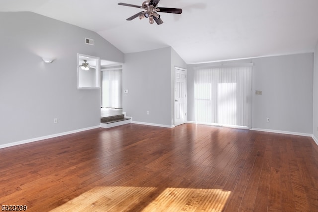 unfurnished living room with a wealth of natural light, wood-type flooring, ceiling fan, and lofted ceiling