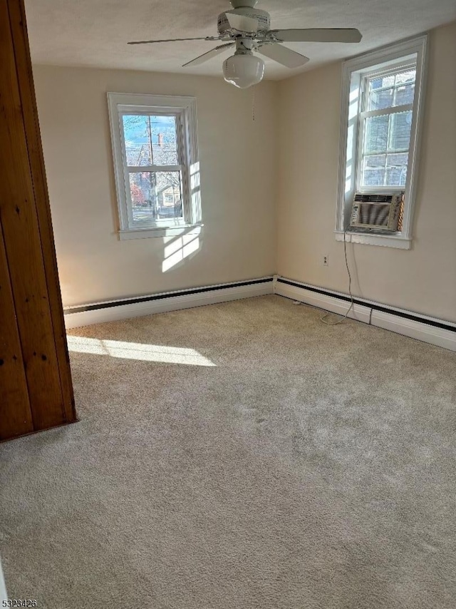 empty room featuring ceiling fan, cooling unit, and light colored carpet