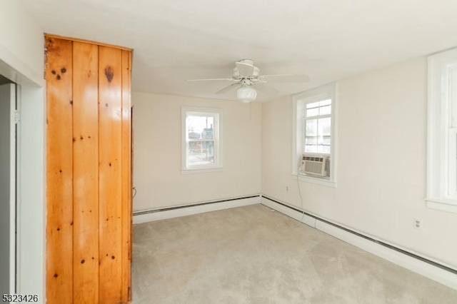 unfurnished room featuring light colored carpet and ceiling fan