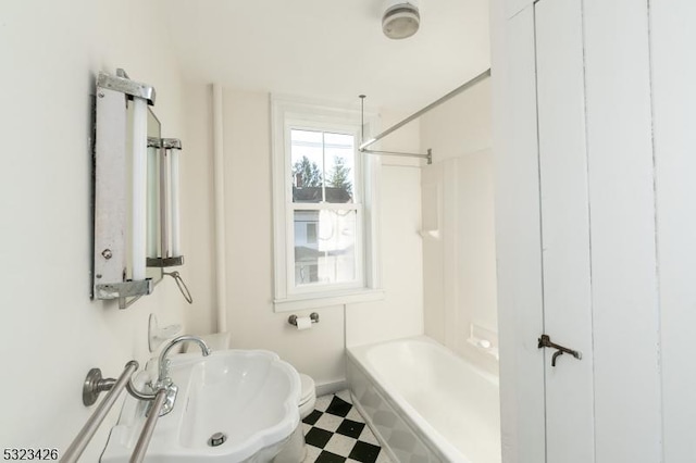 bathroom with shower / bathing tub combination