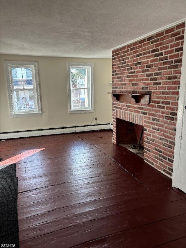 unfurnished living room with a baseboard radiator, a healthy amount of sunlight, dark hardwood / wood-style floors, and a brick fireplace