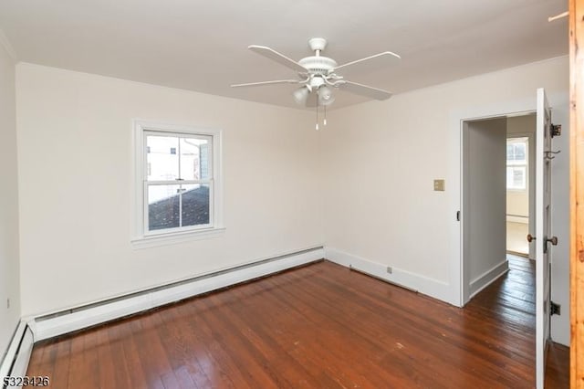 unfurnished room featuring baseboard heating, ceiling fan, and dark hardwood / wood-style floors